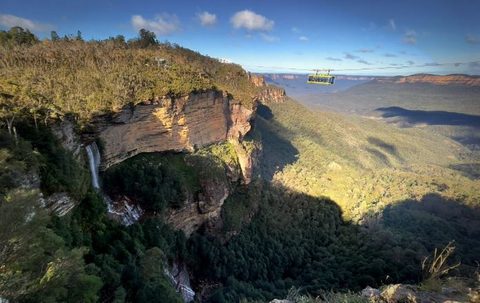 A view across the Blue Mountains escarpment with the scenic cableway crossing the valley — one of the destinations on Morhaven supported holidays.